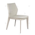 White saddle leather armless dining chairs